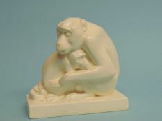 JOHN SKEAPING FOR WEDGWOOD: WHITE GLAZED (MOONSTONE) MODEL of a monkey cuddling her young, impressed