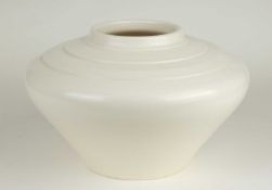 KEITH MURRAY FOR WEDGWOOD: WHITE GLAZED (MOONSTONE) WIDE SQUAT VASE, 17.5 (h) x 27.5cms (diam.)