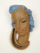 GOLDSCHEIDER ART DECO WALL MASK of a lady with blue hair, black printed backstamp and impressed