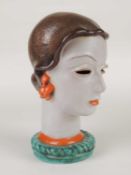 GOLDSCHEIDER ART DECO BUST of a stylised lady, brown, orange, and turquoise glaze, black printed