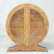 ART DECO WALNUT CIRCULAR DISPLAY CABINET, c. 1935, two doors with original white Bakelite handles,