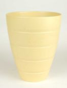 KEITH MURRAY FOR WEDGWOOD: STRAW GLAZED RIBBED VASE, KM factory mark, 24cms (h) Provenance: The