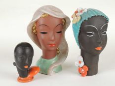 THREE GOLDSCHEIDER STYLE SMALL ART DECO BUSTS of ladies, 18cms (h) the tallest Provenance: The