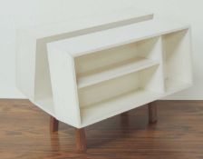 ISOKON DONKEY MARK II BOOK STAND, designed in 1963, with original paper label, 40 (h) x 53.5cms (