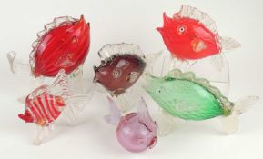 SIX MURANO COLOURED GLASS FISH ORNAMENTS, including ruby glass fish, 21cms (h); amethyst glass