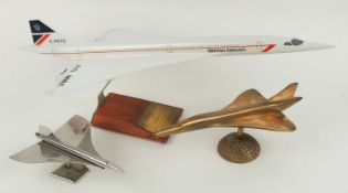 CONCORDE INTEREST: A PRESENTATION MODEL OF BRITISH AIRWAYS CONCORDE, inscribed to base 'Presented by