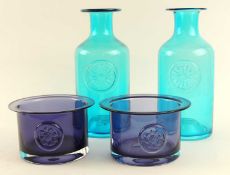 TWO DARTINGTON TURQUOISE BOTTLE VASES, 25cms (h); together with two Dartington amethyst bottle
