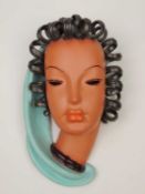 GOLDSCHEIDER ART DECO WALL MASK, Prischel, black and turquoise glaze, impressed marks to reverse,