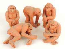 FIVE SCULPTED TERRACOTTA MODELS OF CHIMPANZEES, unsigned, 15cms (h), smallest 12cms (h) (5)