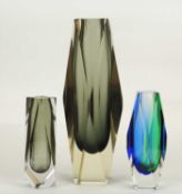 THREE MURANO SOMMERSO FACETED GLASS VASES: grey case in clear and yellow, 30cms (h); blue cased in