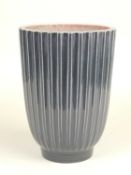 NORMAN WILSON FOR WEDGWOOD: GREY FLUTED VASE with pink glazed interior and base, NW Wedgwood factory