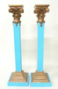 PAIR OF DECORATIVE GILT & BLUE PAINTED WOODEN & CAST RESIN CORINTHEAN TORCHÈRES, 111cms (h), tops