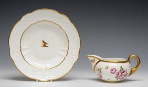 SWANSEA PORCELAIN ARMORIAL DISH & JUG, comprising moulded border soup plate with gilded bird crest