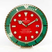 ROLEX-STYLE WALL CLOCK, modelled as an Oyster Perpetual Submariner watch, red dial, electric