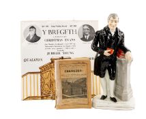 RARE STAFFORDSHIRE POTTERY FIGURE OF REV CHRISTMAS EVANS, 19th century, wearing black jacket and