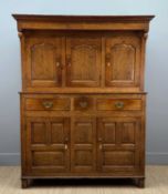 18TH C. WELSH OAK DEUDDARN, moulded cornice supporting suspended turned finials, three arch-panelled