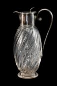 EDWARDIAN GLASS & ELECTROPLATE MOUNTED CLARET JUG, wrythen blown glass base on circular foot,