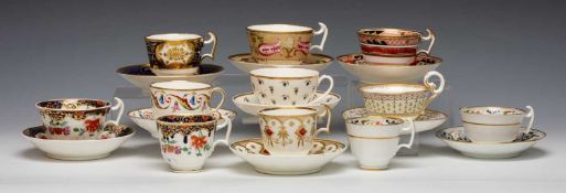 GROUP OF SWANSEA PORCELAIN TEACUPS & SAUCERS in various set patterns, comprising two trios, and