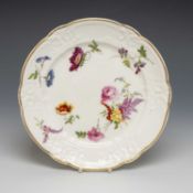 NANTGARW PORCELAIN DESSERT PLATE, typically moulded border within solid gilt rim, decorated with