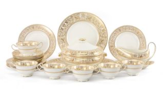 WEDGWOOD 'GOLD FLORENTINE' PATTERN DINNER SERVICE, for six place settings, including soup coupes and