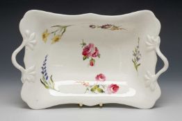 SWANSEA PORCELAIN TWIG-HANDLED DISH, non-moulded and non-gilded, decorated with sprigs of flower