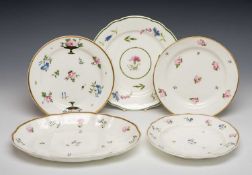 GROUP OF WELSH PORCELAIN DISHES, four with gilt line rims, last with green line rim, all painted