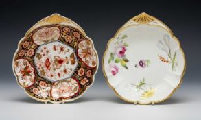 TWO SWANSEA FAN-HANDLED DISHES, comprising floral decorated with gilding, and set pattern no. 236