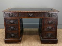 FLEMISH STAINED OAK PEDESTAL DESK, animal mask carved handles, 75 (h) x 123 (w) x 67cms (d)