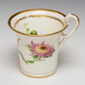 SWANSEA CABINET OR CABARET CUP with an everted rim, turned foot and gilded handle with biting
