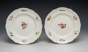 PAIR OF SWANSEA PORCELAIN PLATES, typically moulded border, flower sprig decorated with larger study