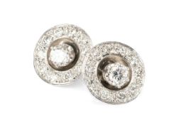 PAIR OF WHITE METAL DIAMOND HALO EARRINGS, the central stones (0.25cts approx. each) within