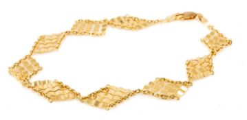 18CT GOLD FANCY LINK BRACELET, stamped '750', 5.3g Provenance: private collection Caerphilly