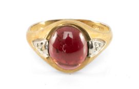 9CT GOLD GENT'S CABOCHON GARNET SIGNET RING, set with diamond chips to the shoulders, ring size V,