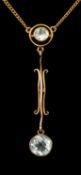 9CT GOLD & AQUAMARINE PENDANT NECKLACE, the pendant set with two round-cut aquamarines, the