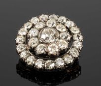 ANTIQUE DIAMOND TARGET BROOCH / PENDANT, having central old-cut stone (1.0cts approx.) within border