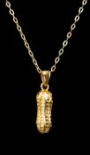 YELLOW METAL 'PEANUT' PENDANT on fine chain link necklace, both indistinctly marked '999' and with