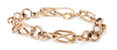 9CT GOLD OPEN CAGE & RING LINK BRACELET, unmarked, 19cms (l), 24.6g Provenance: deceased estate