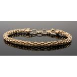 9CT GOLD HOLLOW BRICK TUBE BRACELET, 18.5cms (l), with additional chain links adding 3cms, 10.2g
