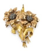 ANTIQUE GARRARD YELLOW METAL FLORAL PIN / BROOCH, modelled as two interconnected flowers set with