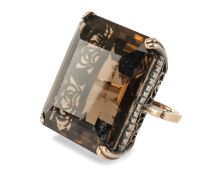 DECORATIVE LARGE SMOKY QUARTZ DRESS RING in silver gilt, stone 31 x 25mms, ring size M Provenance: