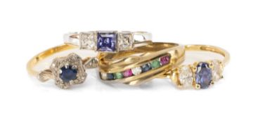 FOUR DRESS RINGS comprising 9ct white gold three-stone amethyst and CZ ring, 18ct gold sapphire