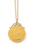 1910 EDWARD VII GOLD SOVEREIGN PENDANT, on unmarked yellow metal scrolled mount, presumed 9ct