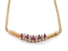 9CT GOLD RUBY & DIAMOND CHIP NECKLACE, 45cms long, 3.1g in box Provenance: deceased estate Swansea