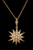 EDWARDIAN 15CT GOLD SEED PEARL STAR PENDANT BROOCH, 35 x 22mms, 2.9g; suspended from a 9ct gold fine