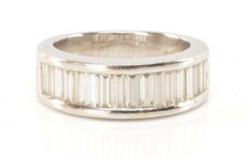 18CT WHITE GOLD DIAMOND HALF-HOOP RING, comprising seventeen baguette-cut diamonds, 2.7ct overall