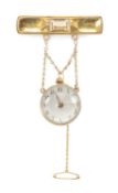 GERMAN BALL WATCH, 30mms (diam.), suspended from a German 8k gold quartz-set bar brooch. Provenance: