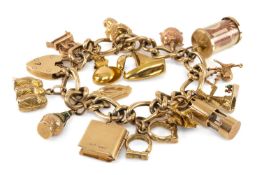 9CT GOLD CHARM BRACELET, with fifteen 9ct gold charms and a yellow metal charm including