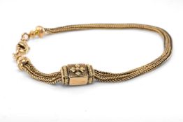 VICTORIAN GOLD LADIES' WATCH CHAIN converted to a bracelet, two herringbone strands with a sliding