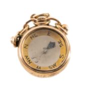 9CT GOLD COMPASS FOB, 19mms, gross weight 4.9g Provenance: private collection Cheshire