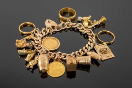 9CT GOLD CURB LINK CHARM BRACELET, with padlock clasp and safety chain, supporting a number of